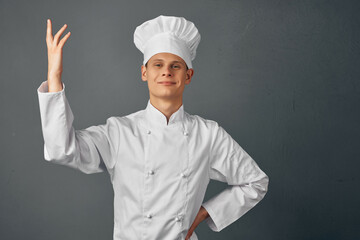 man in chef's uniform gesturing with his hand emotions uniform work restaurant