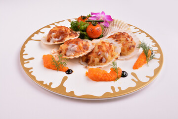 bbq baked cheese fresh scallop on shell seafood canapés with nice plating in white background for Christmas festival menu
