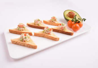 bread toast with coleslaw salad on top canapés snack in white background for Christmas festival menu