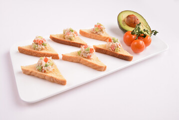 bread toast with coleslaw salad on top canapés snack in white background for Christmas festival menu