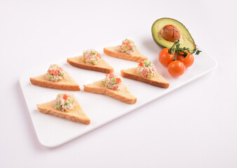 bread toast with coleslaw salad on top canapés snack in white background for Christmas festival menu