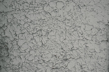 Wall texture with peeling paint. Close up