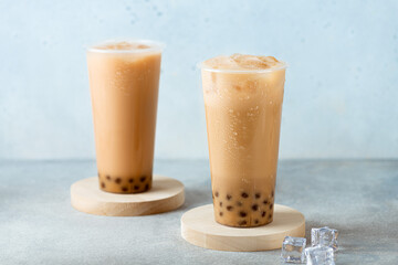 Taiwan milk bubble tea with tapioca in a plastic cup, selective focus