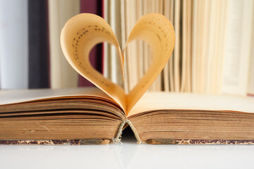 National Book Lovers Day. August 9. The book opens, and the book page rolls into the heart - Powered by Adobe