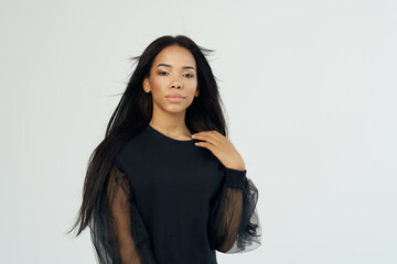Naklejka premium African woman dark long hair Cosmetics posing