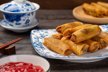 Delicious fried spring rolls and sweet chili sauce