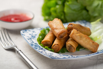 Delicious fried spring rolls and sweet chili sauce