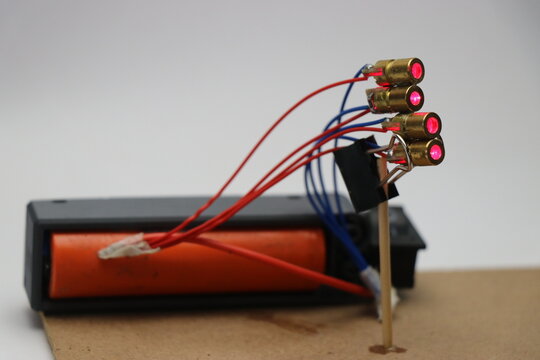 Electronic Hobby Project Using Battery And Red Dot Laser Module. Science Experiments