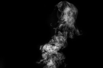 Obraz na płótnie Canvas Perfect mystical curly white steam or smoke isolated on black background. Abstract background fog or smog