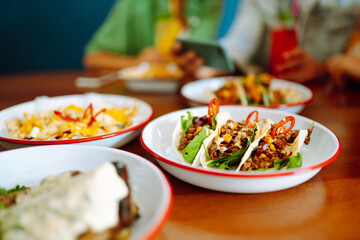 Food Table. Friendly dinner in a cafe.People, lifestyle, lunch, party, relax concept.