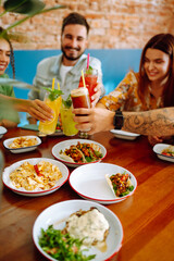 Food Table. Friendly dinner in a cafe.People, lifestyle, lunch, party, relax concept.