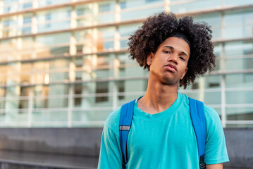 Afro latin male teenager in the city