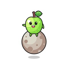 illustration of green apple cartoon sitting on the moon