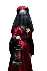 Isolated mysterious sorceress or witch in red gothic dress, black veil and crown with skull and roses holding an ancient lantern. Halloween concept