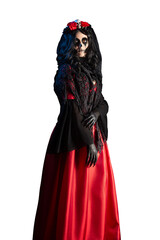 Isolated photo of Santa Muerte in red gothic dress, shawl and crown with skull and roses. Halloween concept. 