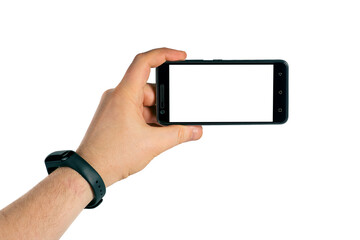 Male hand with fitness tracker and smart phone isolated on white background.