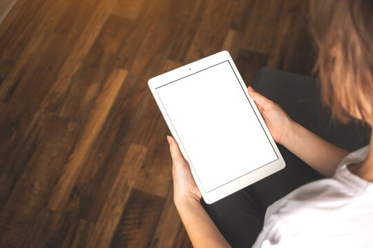 Business Woman Working On Tablet Computer. Tablet Vertical Screen Mockup With Copy Space Photo