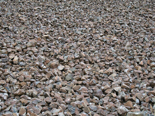 Naturally eroded basalt stone scree fragments at Giant's Causeway on the Antrim Coast in Northern Ireland, UK