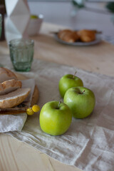 Morning breakfast at the table at home apples