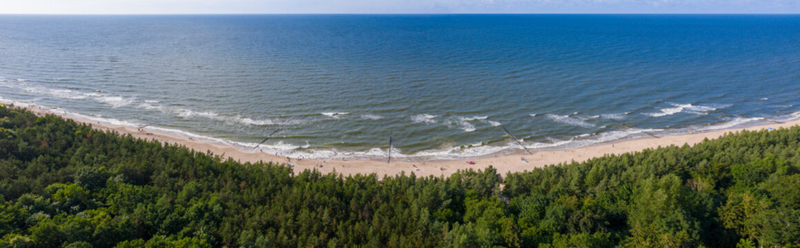 Wide panorama of Baltic Sea sandy beach in the summer