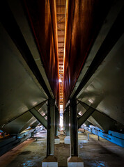 View from below the kernal palm seed storage in a factory.