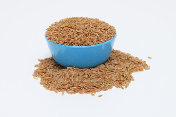 Grain of red wheat for sowing. Grain texture With Bowl