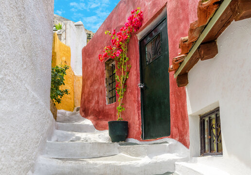 Fototapeta Old narrow street in Anafiotika, Plaka district, Athens, Greece, Europe