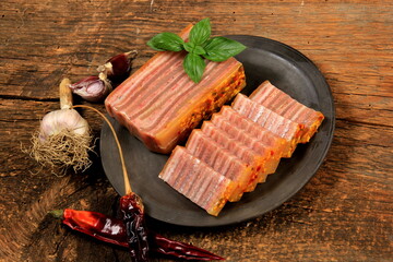 Sliced Pig skin jelly slice plate. pork trotter aspic with spices