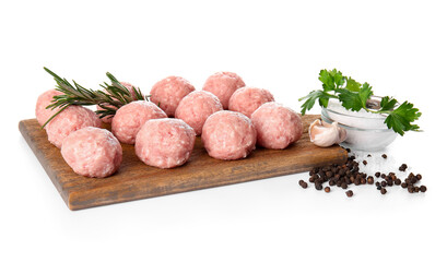 Wooden board with raw cutlets made of fresh forcemeat and ingredients on white background