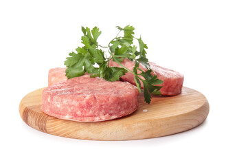Wooden board with raw cutlets made of fresh forcemeat on white background