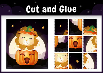 Children board game cut and glue with a cute lion in the halloween pumpkin
