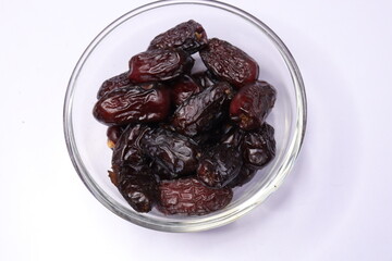 
Raw Organic Dates fruit isolated on a white background

