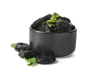 Bowl with tasty prunes on white background