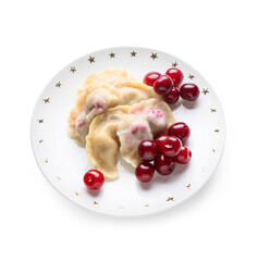 Plate with tasty cherry dumplings on white background
