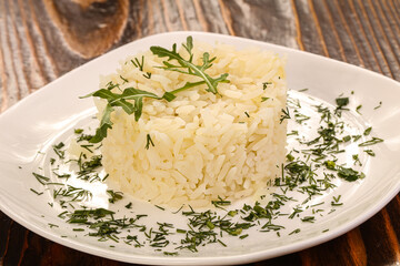 Steamed rice served green herbs