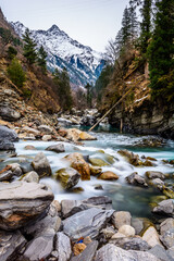 Landscape of glacial river and Himalayan mountains in winter

