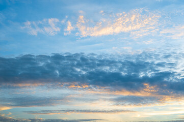 Naklejka na ściany i meble Dramatic blue sky with clouds on sunset