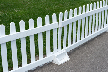 white fence with grass