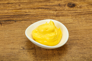 Natural cheese sauce in the bowl