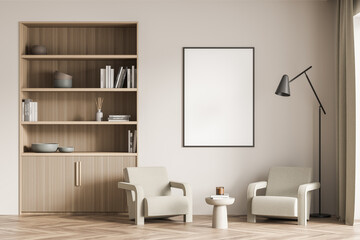 Banner on beige living room wall with niche bookshelf and armchairs
