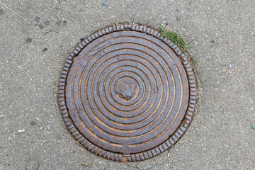 manhole cover in the street