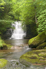 The waterfall on Hoar Oak Water just before it flows into the East Lyn River at Watersmeet, near Lynmouth, Exmoor, Devon