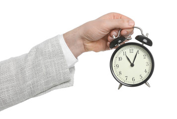 Businessman holding alarm clock on white background, closeup. Time management