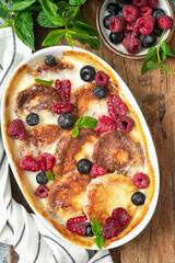 Cottage cheese pancakes, syrniki with fresh berries