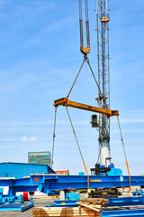 Fototapeta premium Crane loading a steel structure