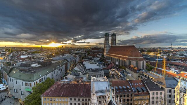 Munich sunset skyline aerial view frauenkirche church dotnwon in city centre.