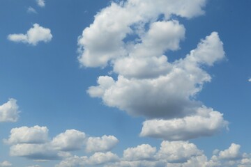 Beautiful fluffy clouds in the blue sky, natural background
