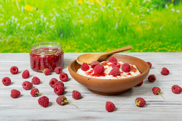 Fresh breakfast - oatmeal with raspberries
