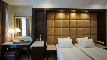 Fototapeta na wymiar Two beds in a hotel room. Interior design