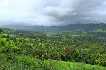 Stunning panoramic landscape view of beautiful Koyna river from the top of a mountain in Mahabaleshwar, Maharashtra, India